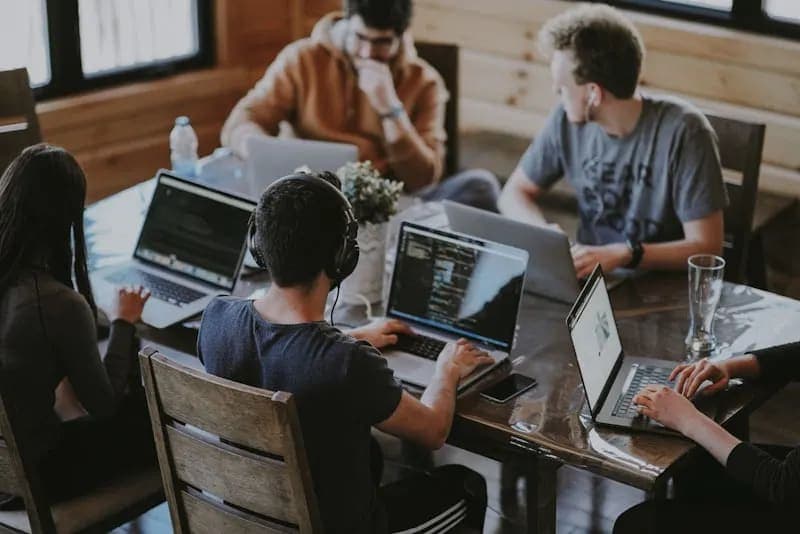 Team collaborating on digital projects in a modern office